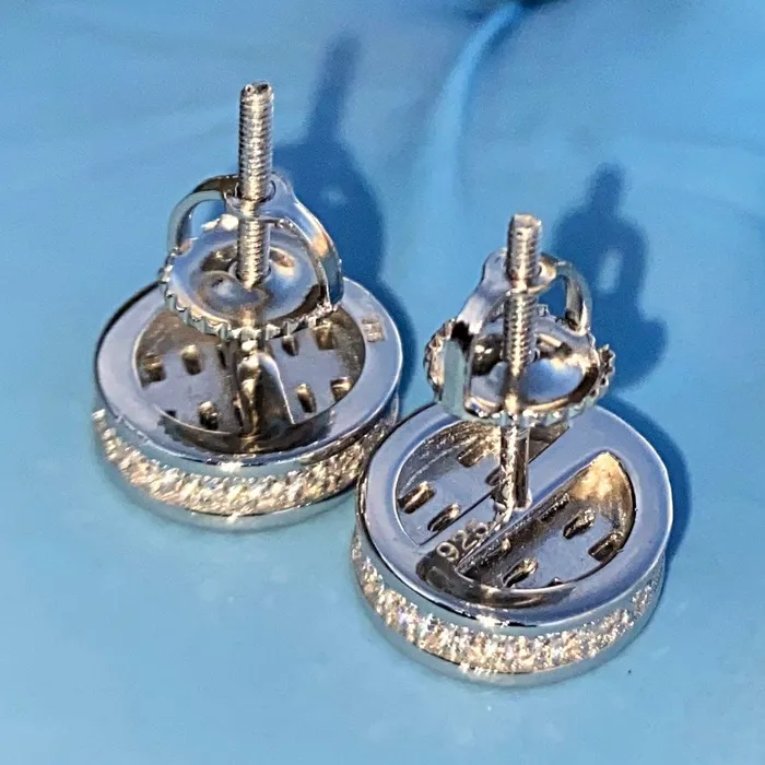 925 Sterling Silver Iced Round Baguette Flooded Out Earrings 10MM Bling Cartel Earrings 925 Sterling Silver Iced Round Baguette Flooded Out Earrings 10MM Bling Cartel Earrings